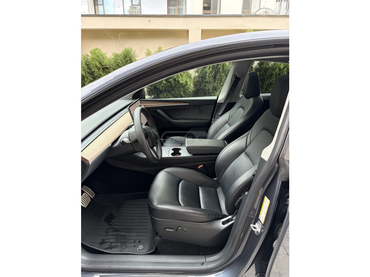 Tesla Model Y - фото 13
