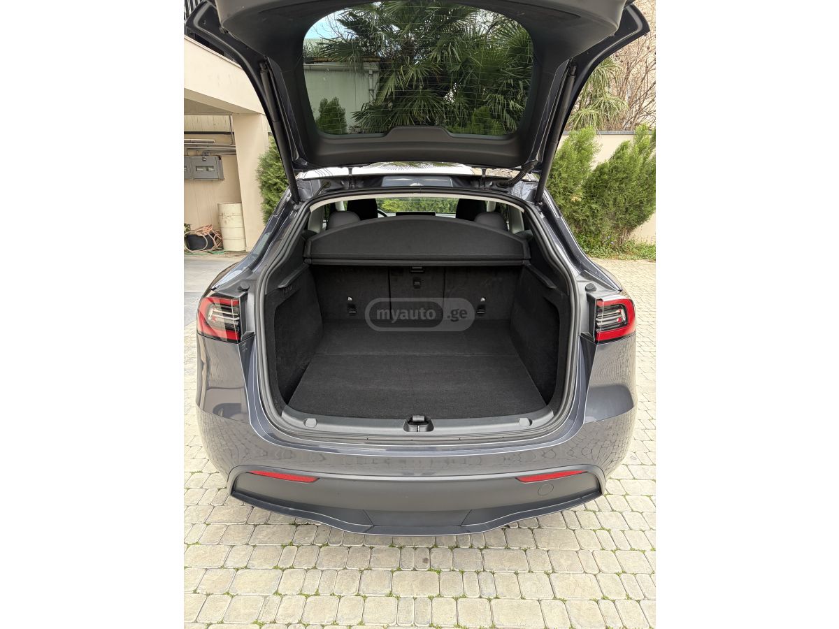 Tesla Model Y - фото 14