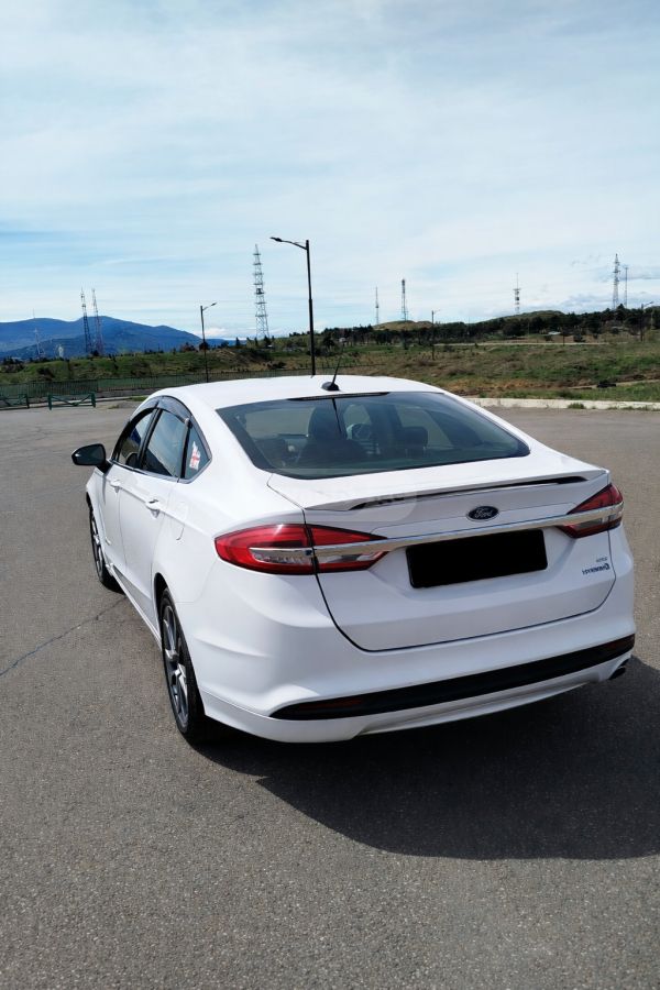 Ford Fusion - фото 7