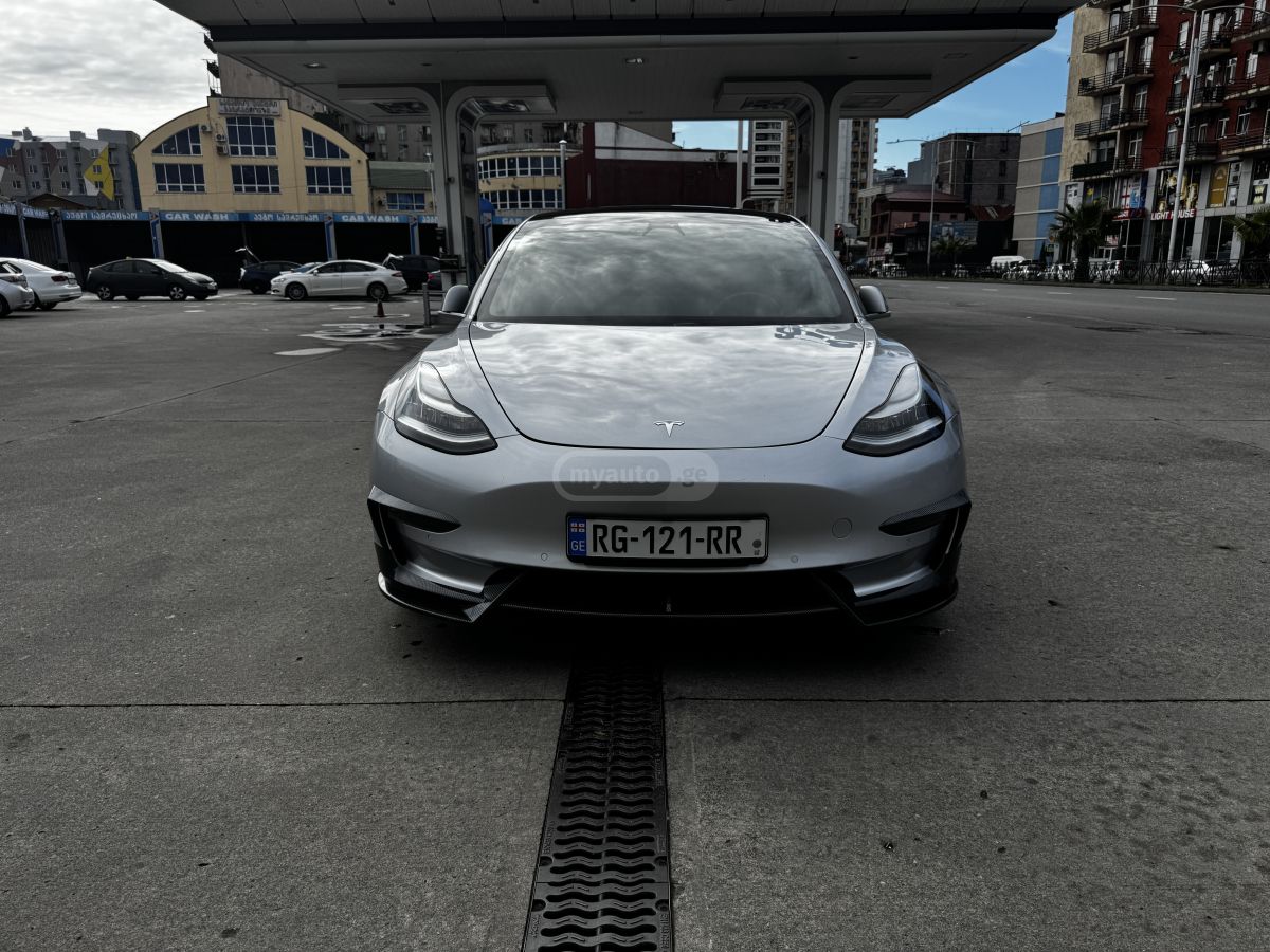 Tesla Model 3 - фото 10
