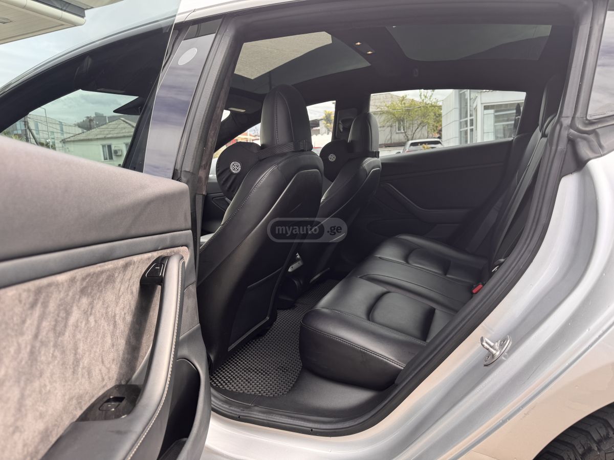 Tesla Model 3 - фото 7
