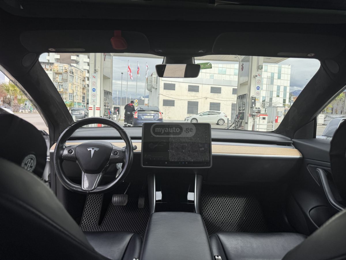 Tesla Model 3 - фото 8
