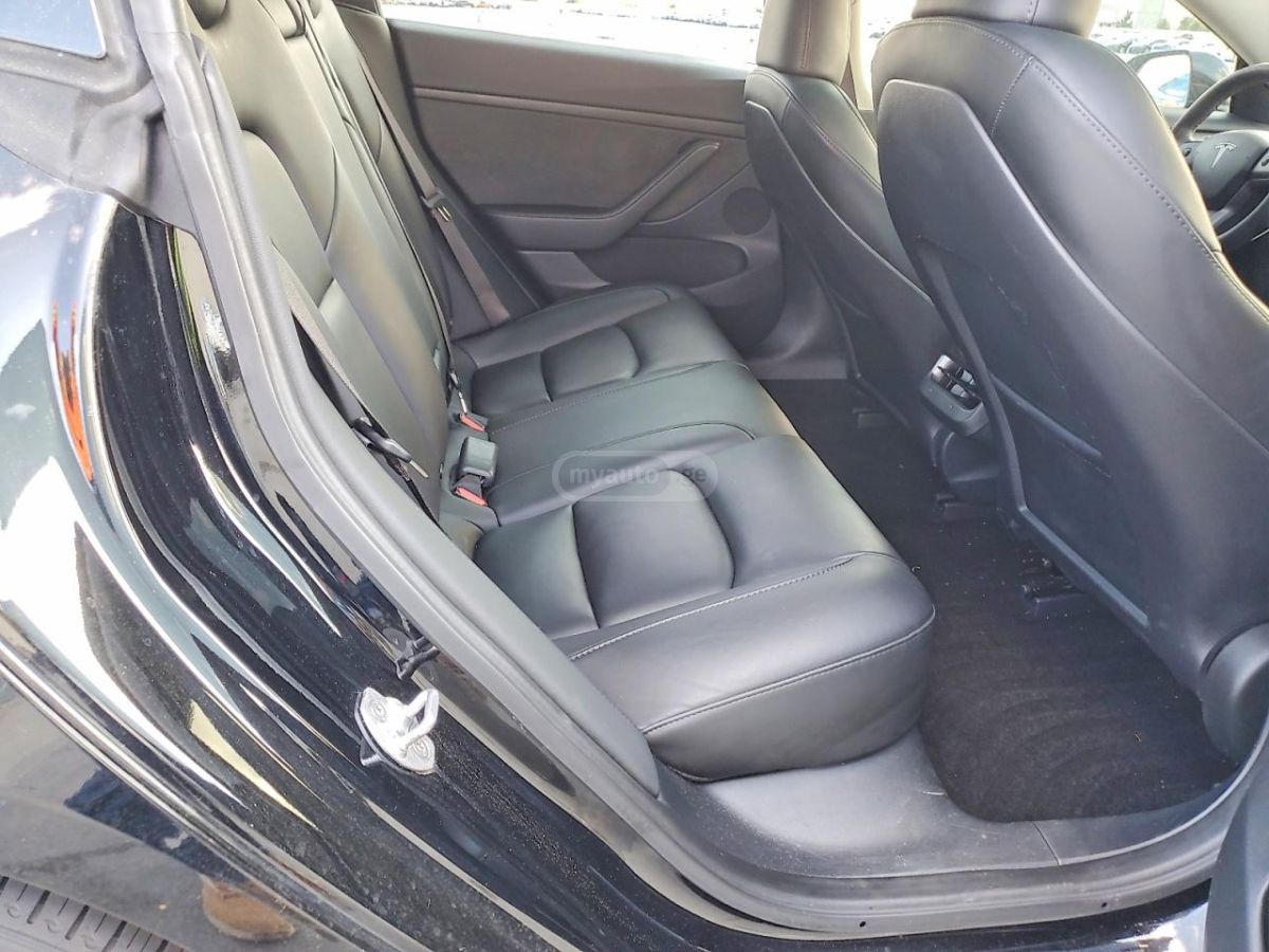 Tesla Model 3 - фото 10