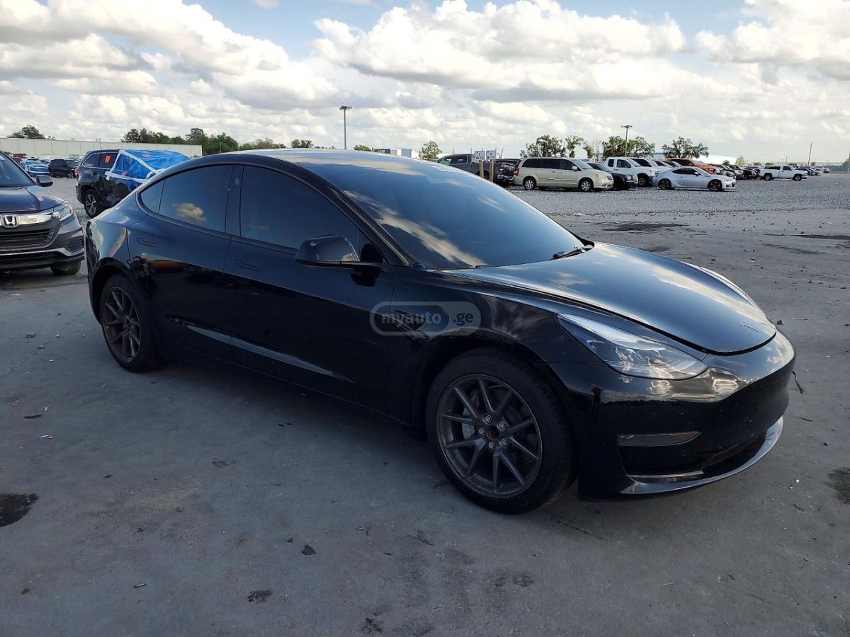 Tesla Model 3 - фото 4