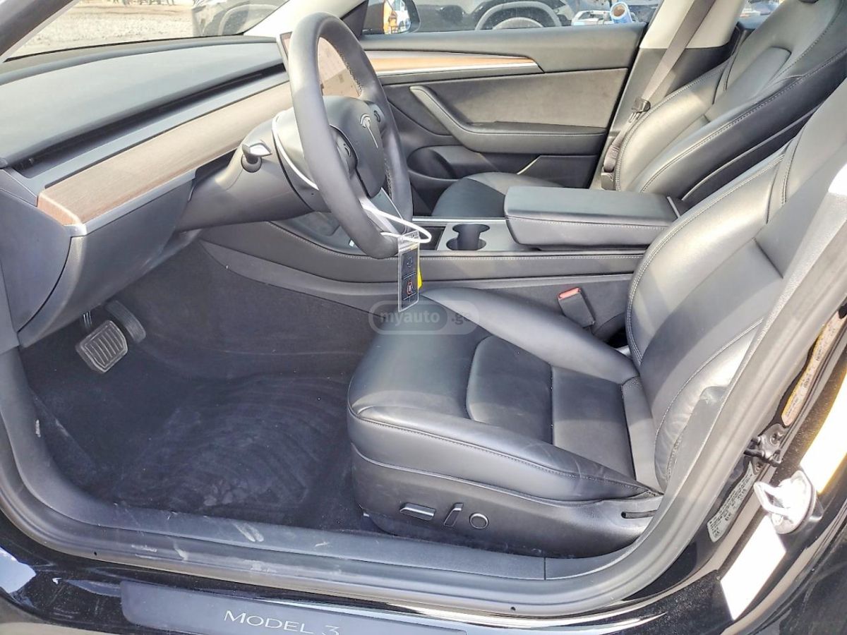 Tesla Model 3 - фото 7