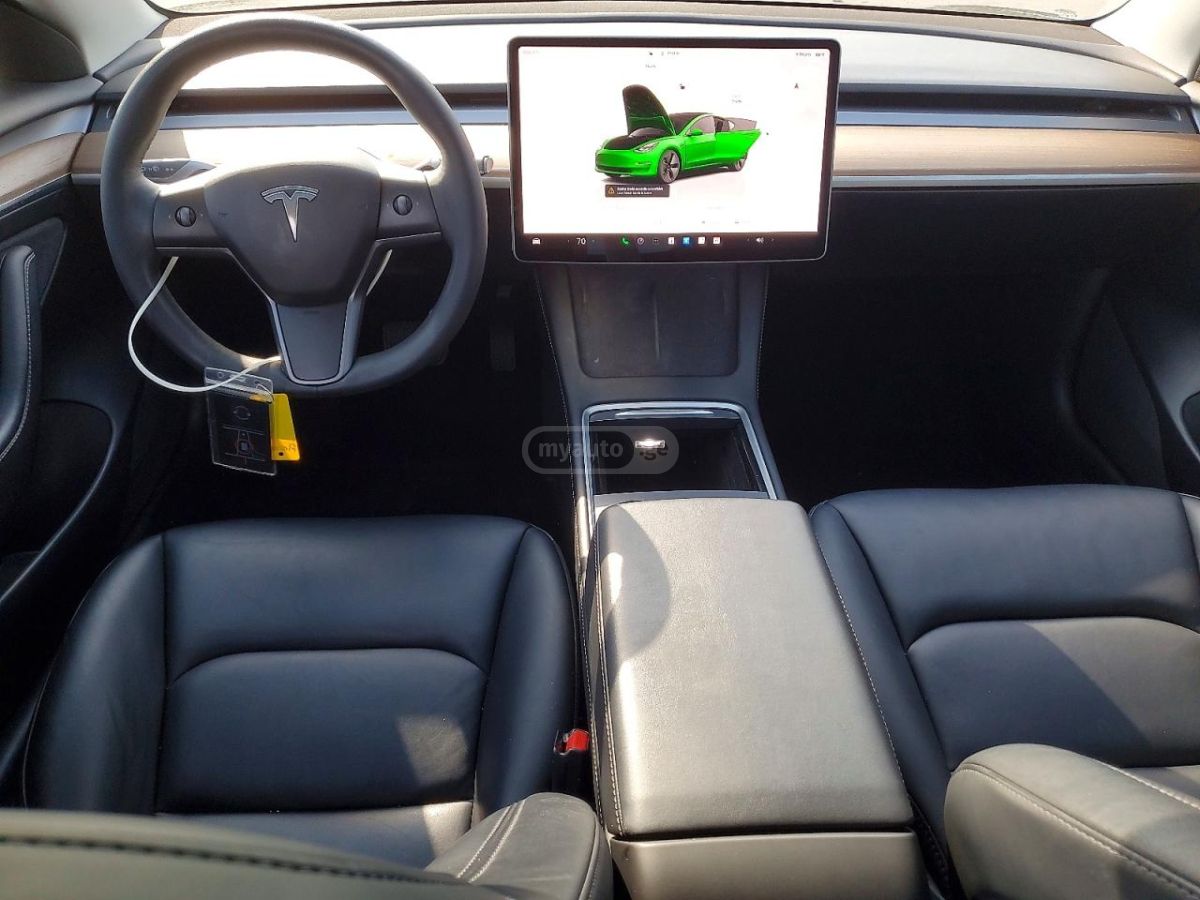 Tesla Model 3 - фото 8