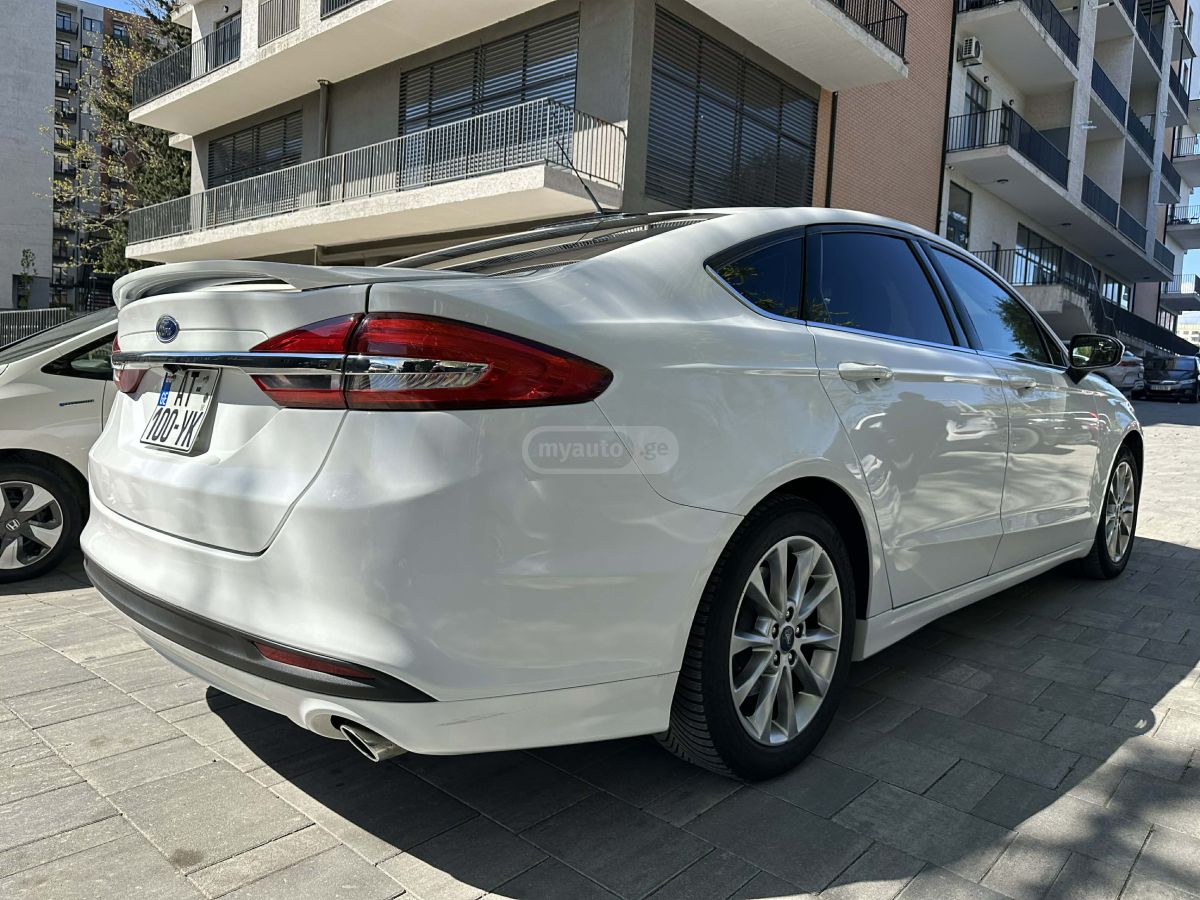 Ford Fusion - фото 10