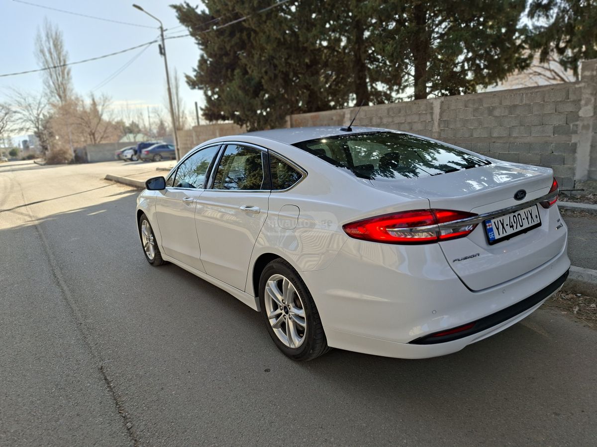 Ford Fusion - фото 7