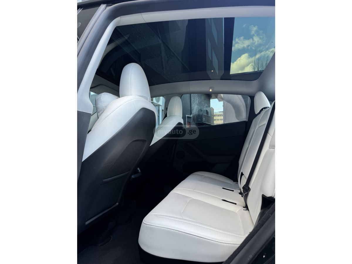 Tesla Model Y - фото 12