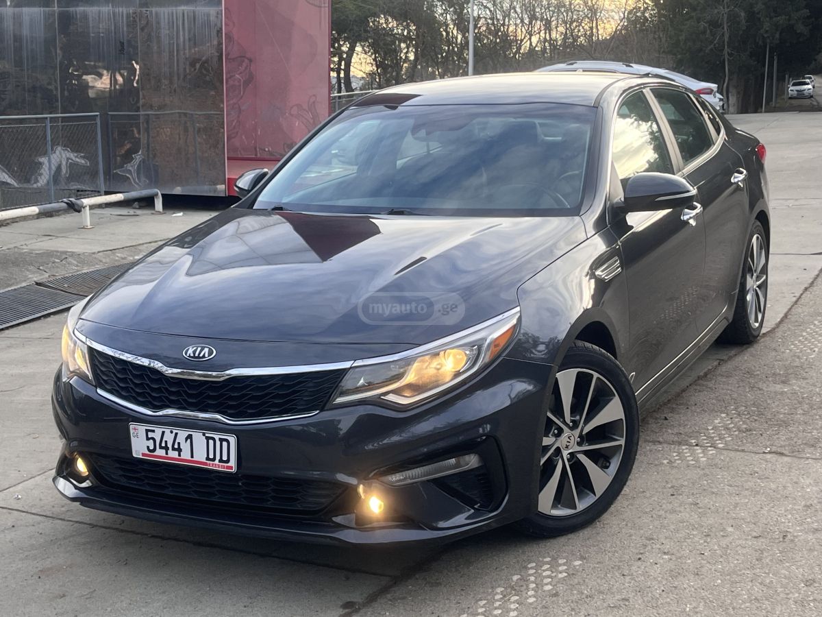 Kia Optima - фото 1