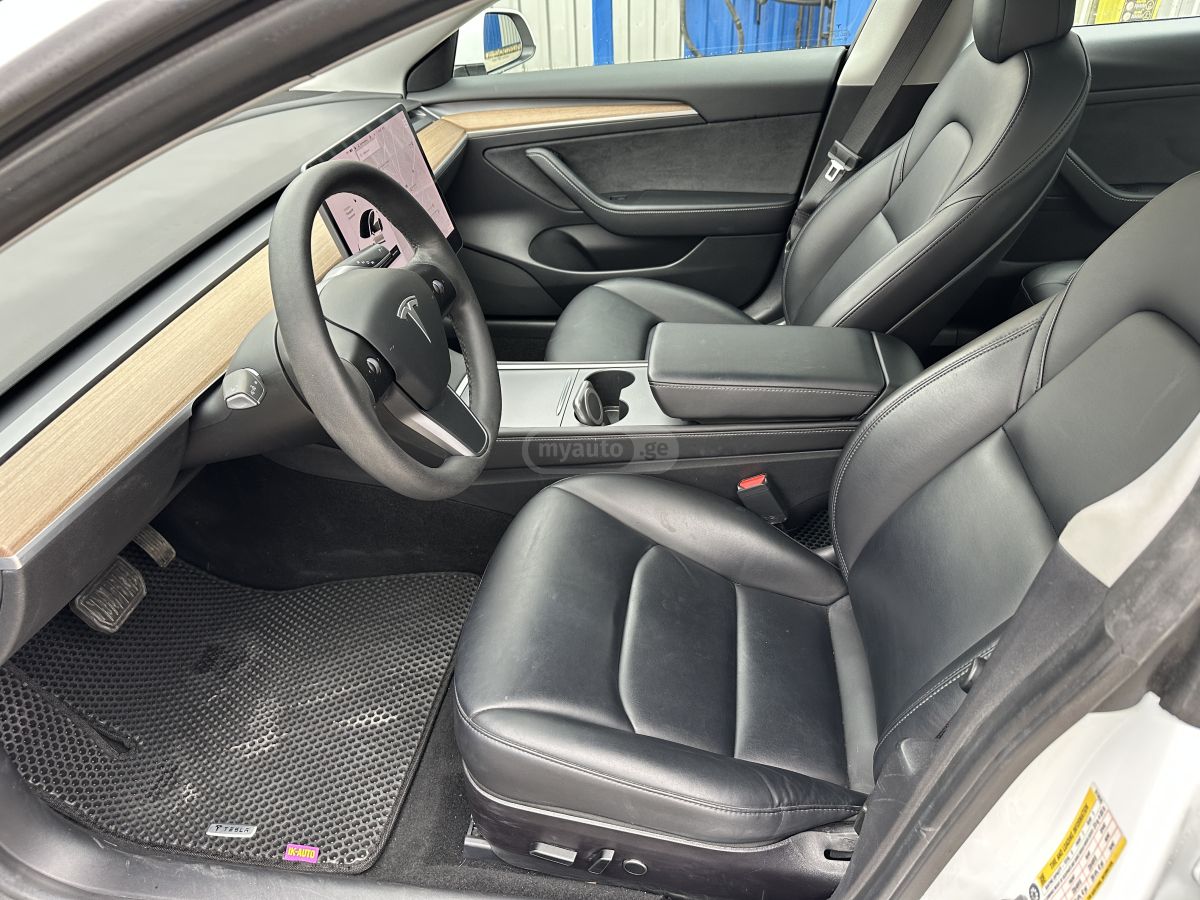 Tesla Model 3 - фото 12