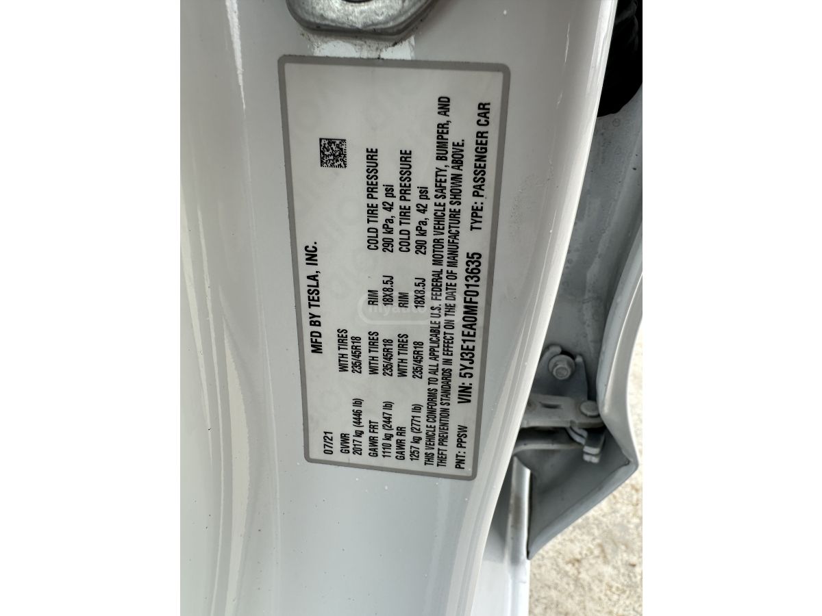 Tesla Model 3 - фото 13