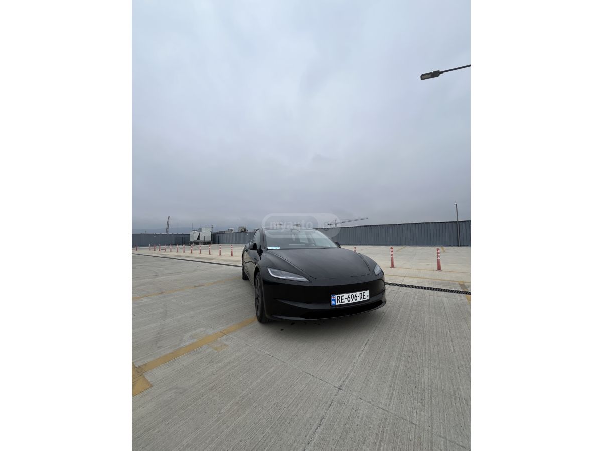 Tesla Model 3 - фото 1