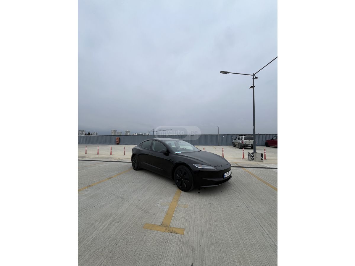 Tesla Model 3 - фото 2
