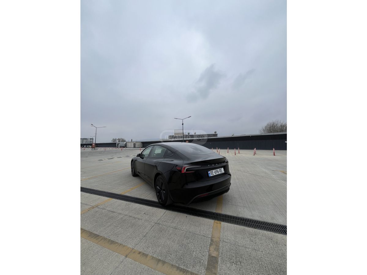 Tesla Model 3 - фото 5
