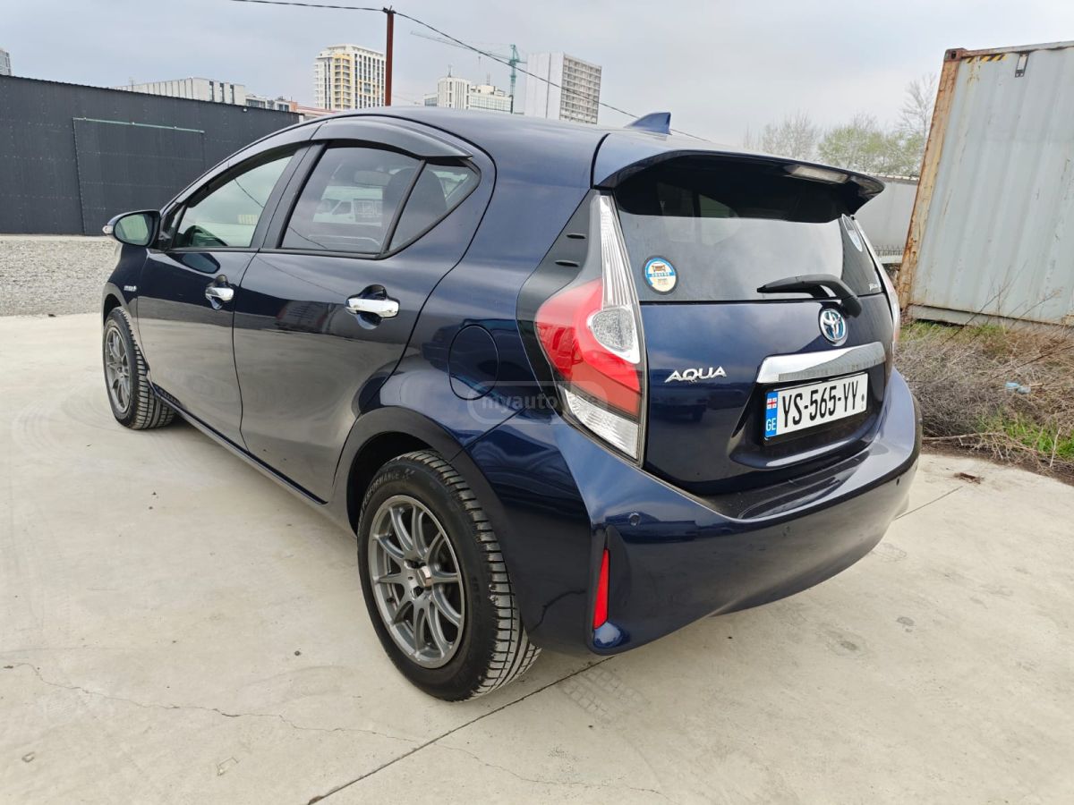 Toyota Aqua - фото 4