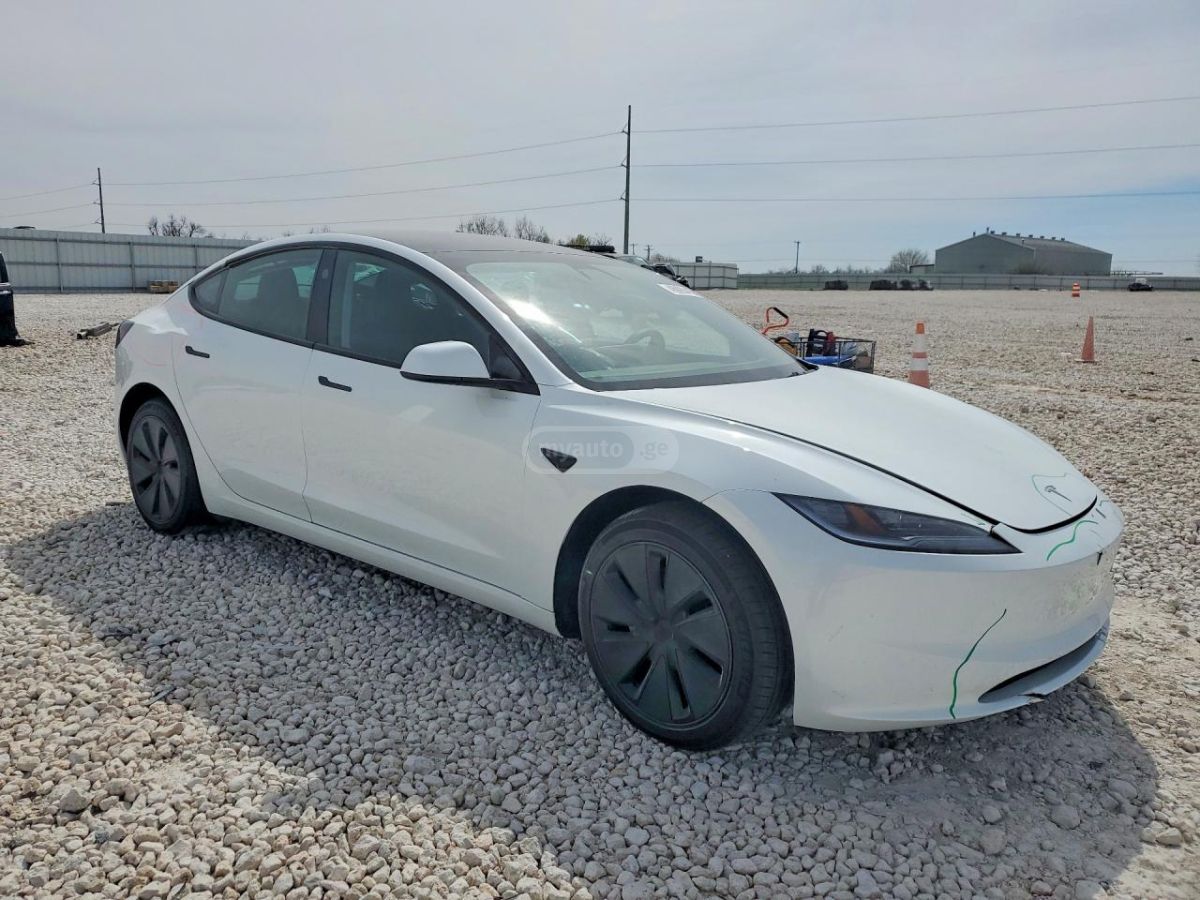 Tesla Model 3 - фото 1