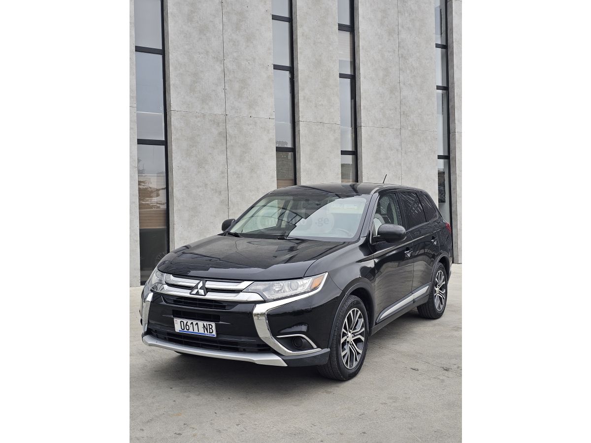 Mitsubishi Outlander - фото 1
