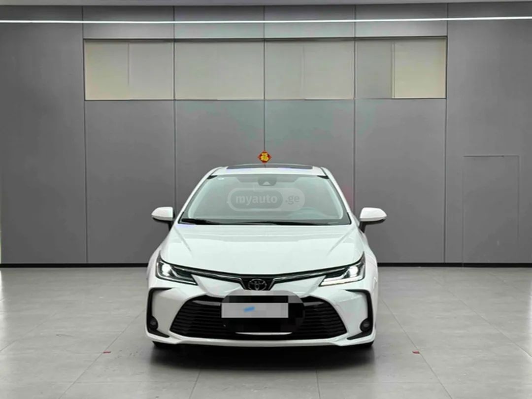 Toyota Corolla Fielder - фото 2