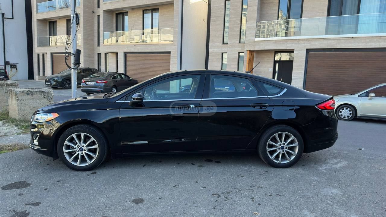 Ford Fusion - фото 6