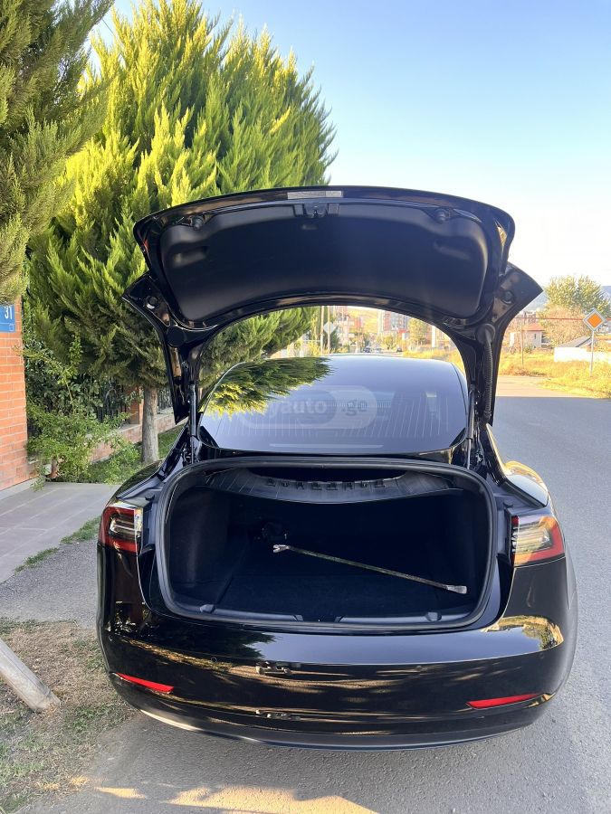 Tesla Model 3 - фото 11