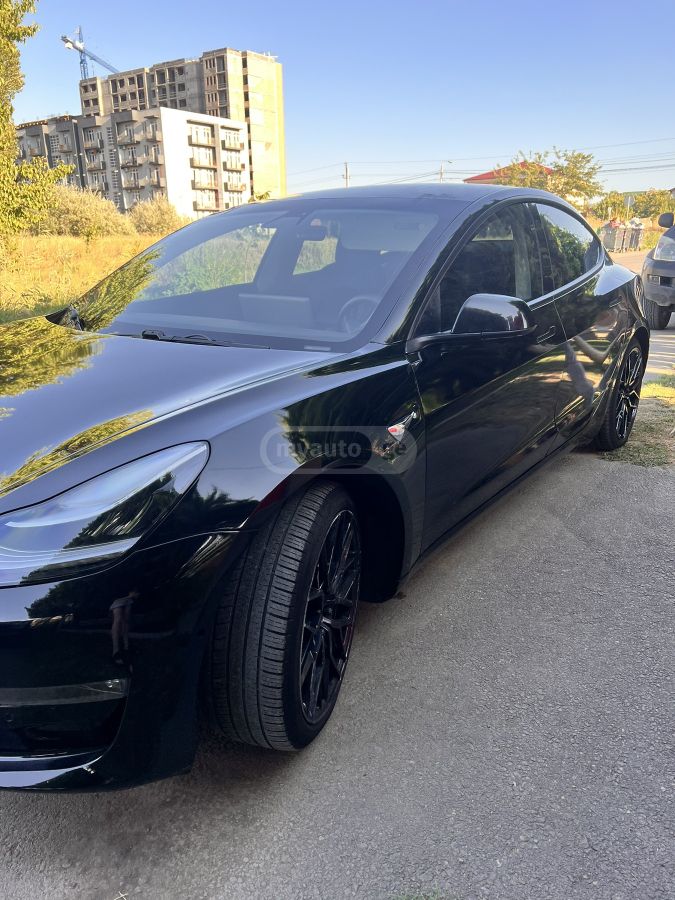 Tesla Model 3 - фото 6
