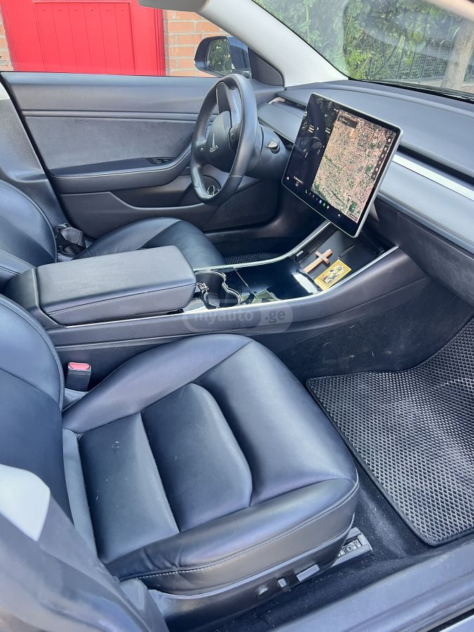 Tesla Model 3 - фото 7