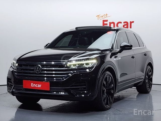 Volkswagen Touareg - фото 1