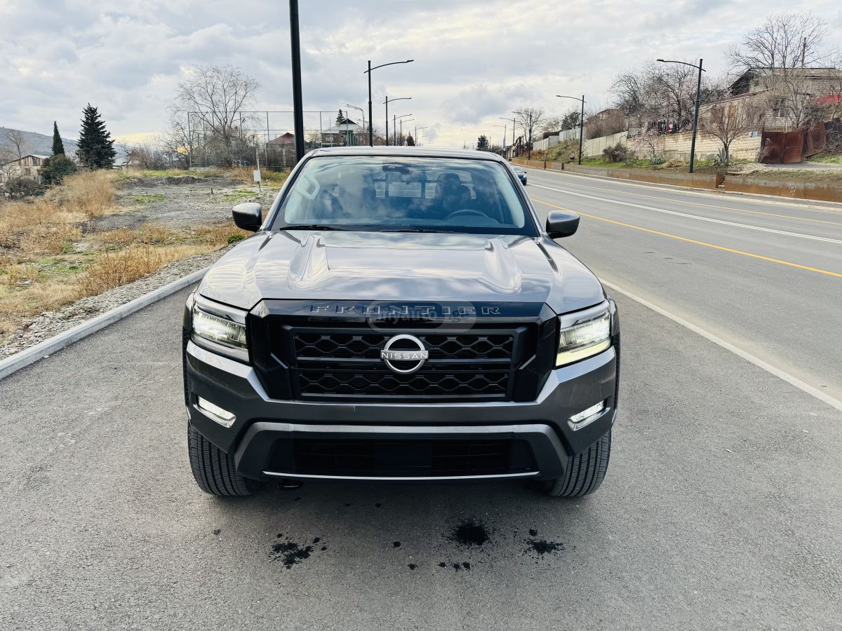 Nissan SV 4x4 Crew Cab 6 ft. box 139. — миниатюра 2