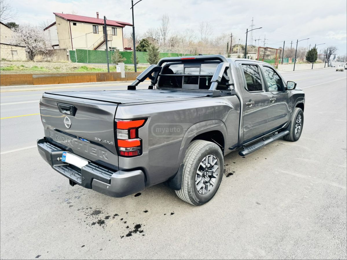 Nissan SV 4x4 Crew Cab 6 ft. box 139. — миниатюра 6