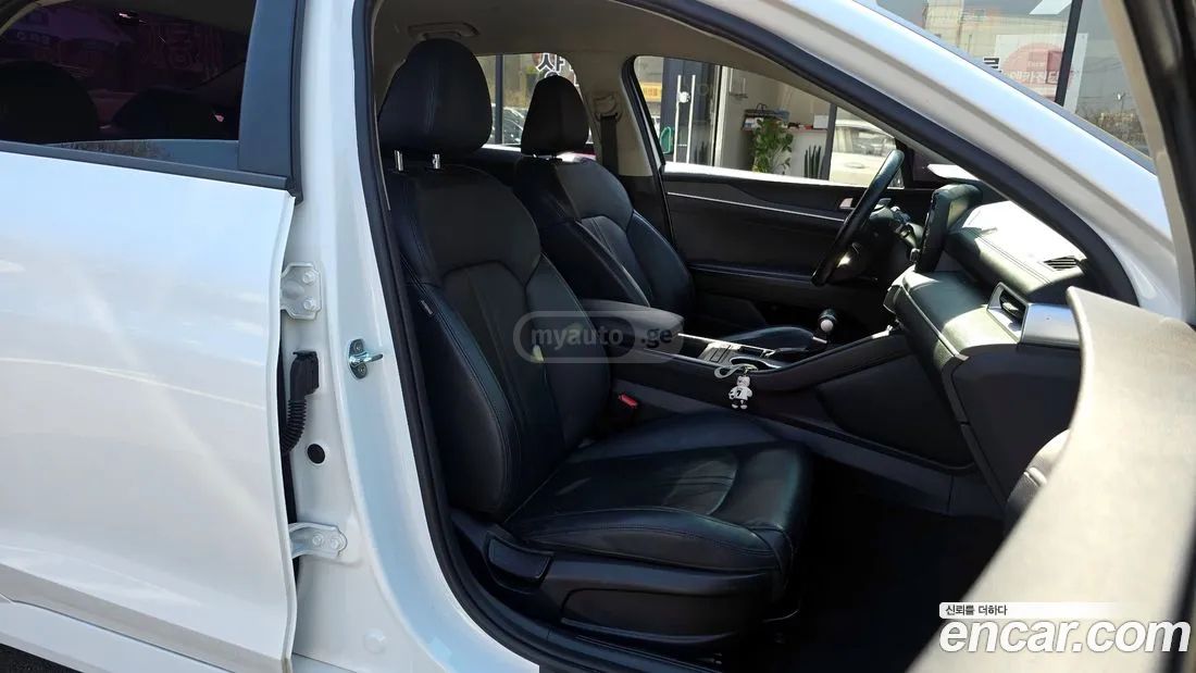 Kia Optima - фото 10