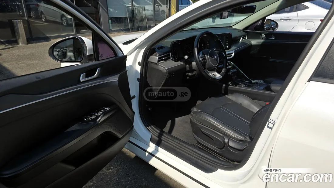 Kia Optima - фото 11