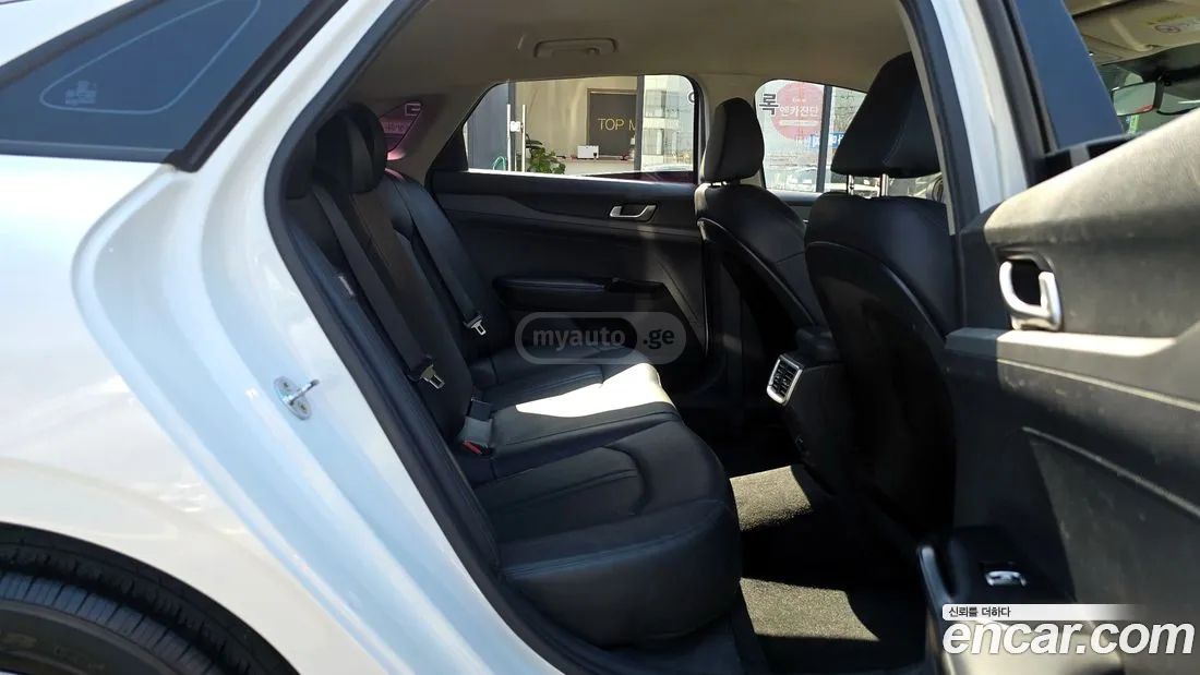 Kia Optima - фото 12