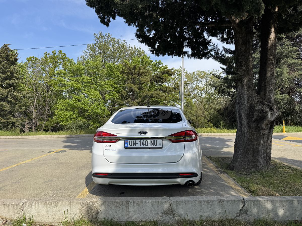 Ford Fusion - фото 6