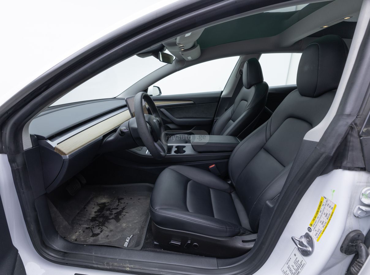 Tesla Model 3 - фото 10