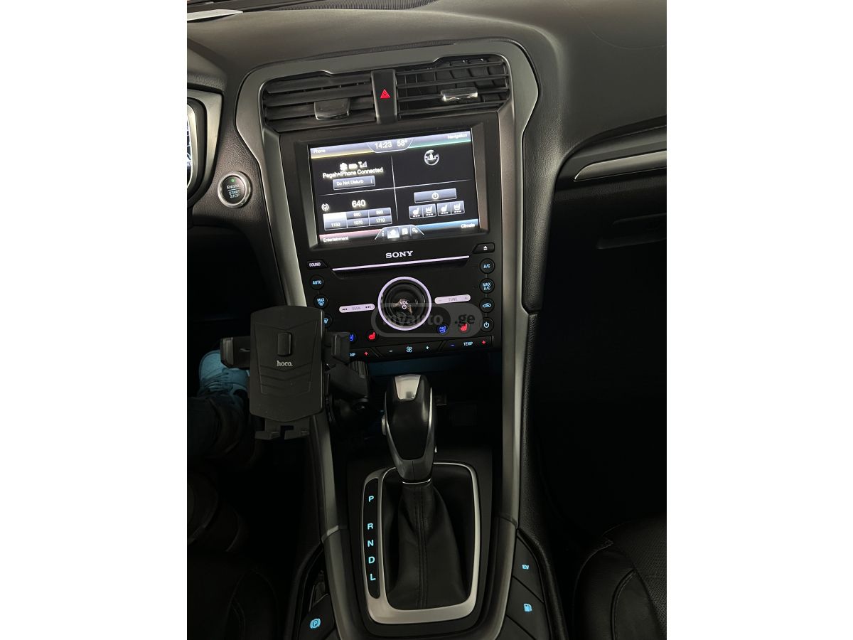 Ford Fusion - фото 11