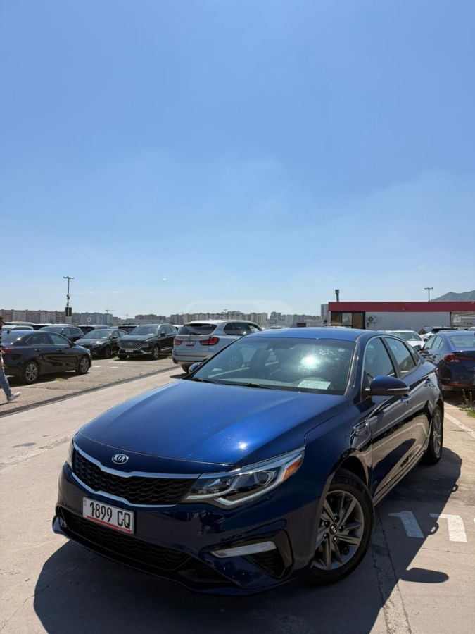 Kia Optima - фото 1