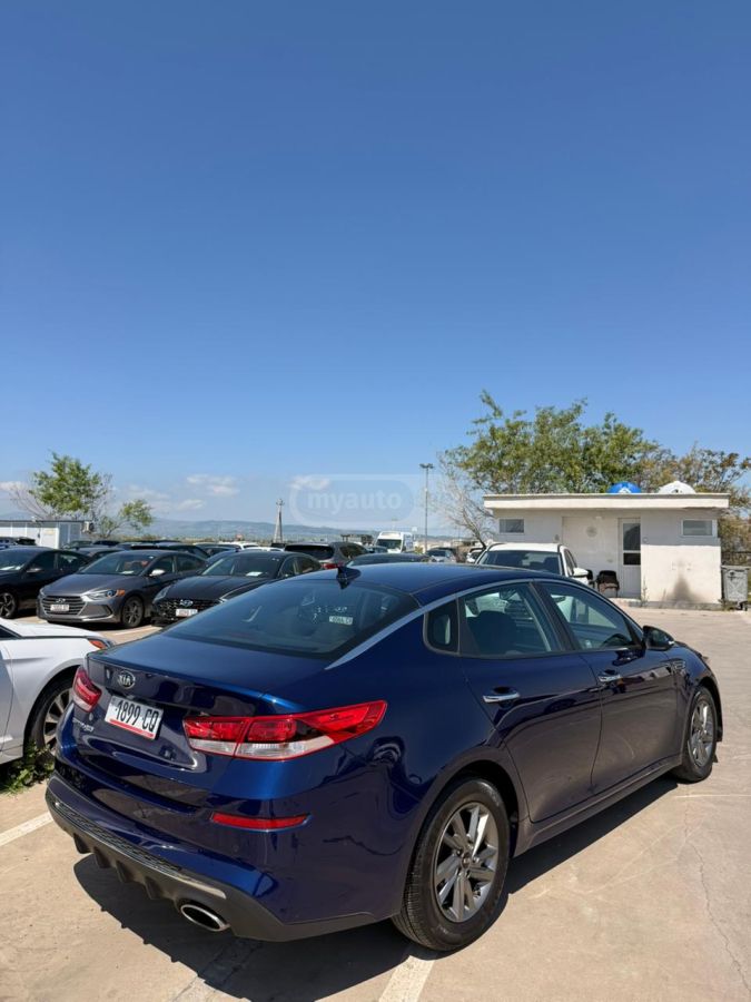 Kia Optima - фото 4