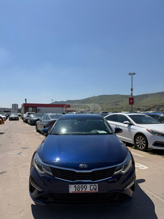 Kia Optima - фото 5