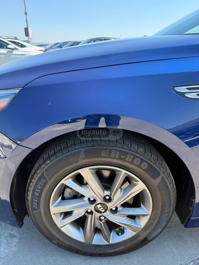 Kia Optima - фото 6