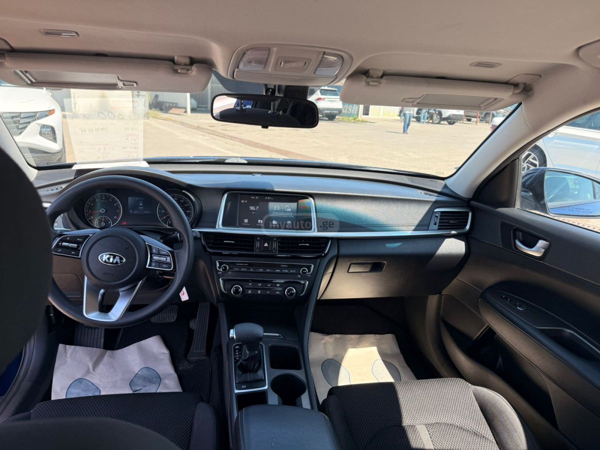 Kia Optima - фото 7