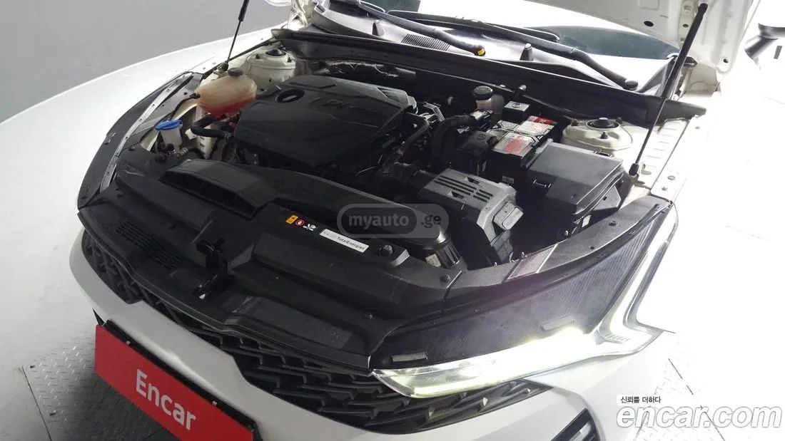 Kia Optima - фото 6