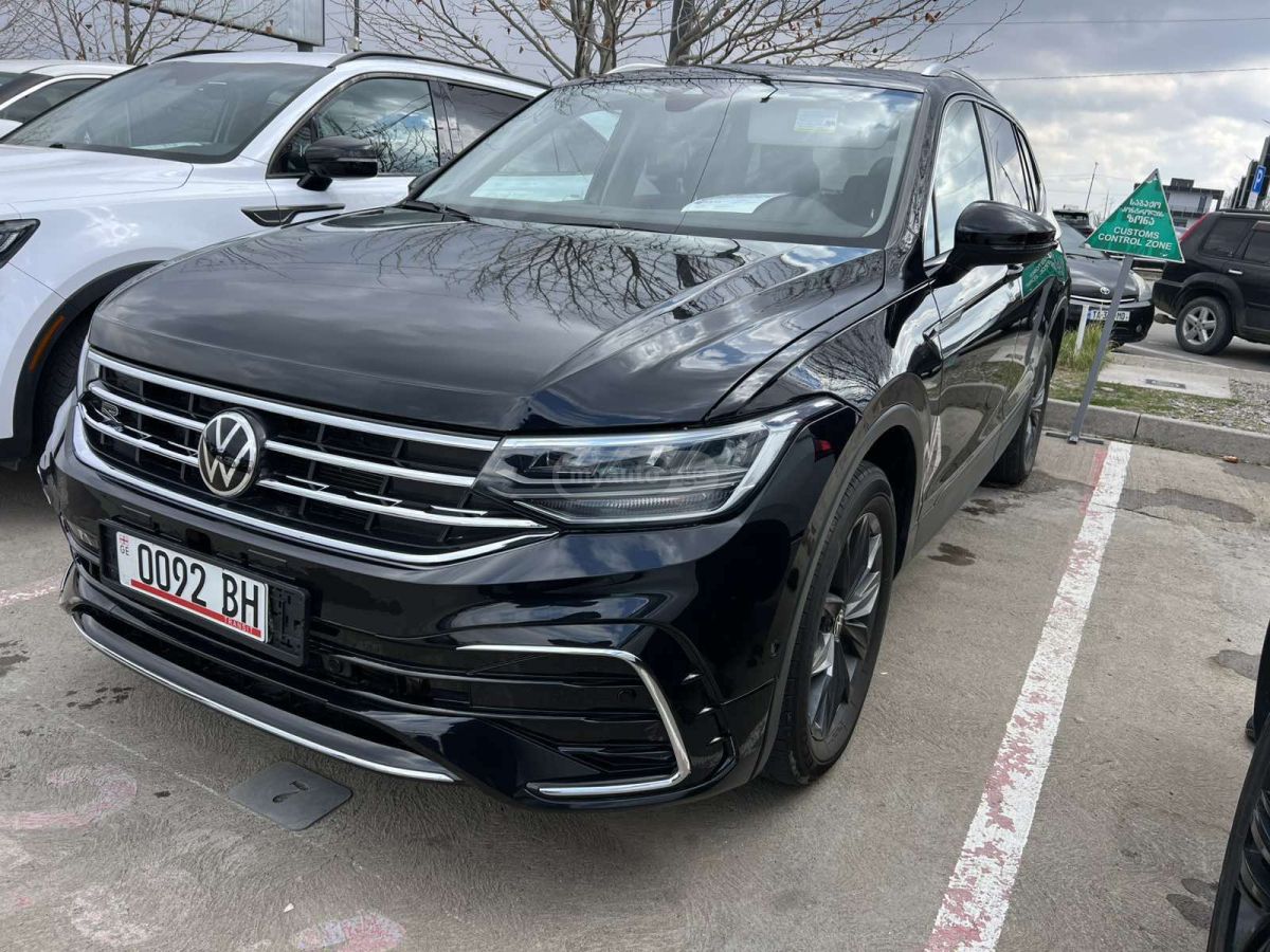Volkswagen Tiguan - фото 1