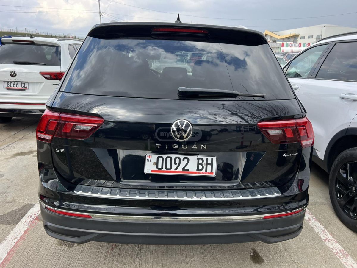 Volkswagen Tiguan - фото 2
