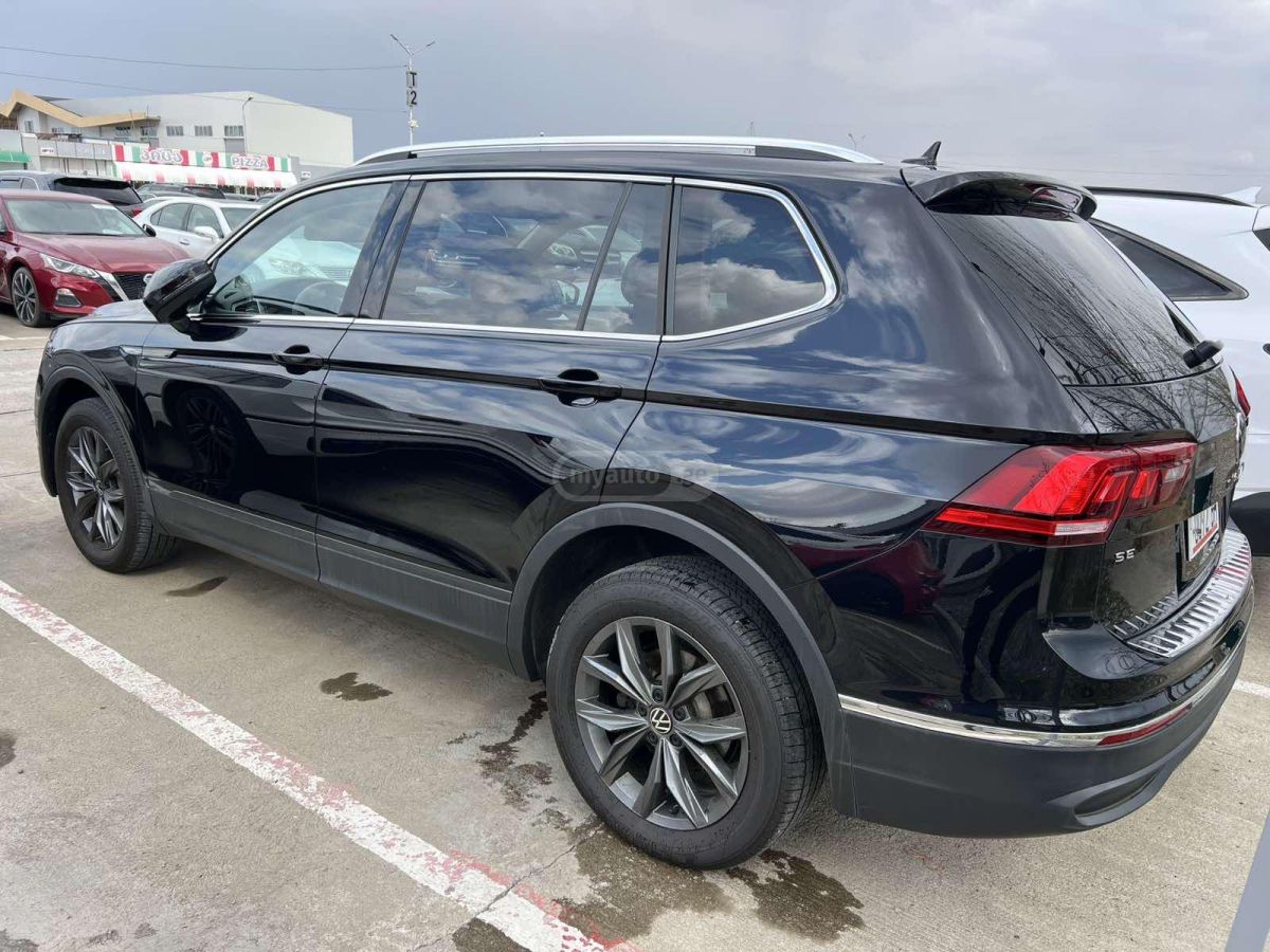 Volkswagen Tiguan - фото 3