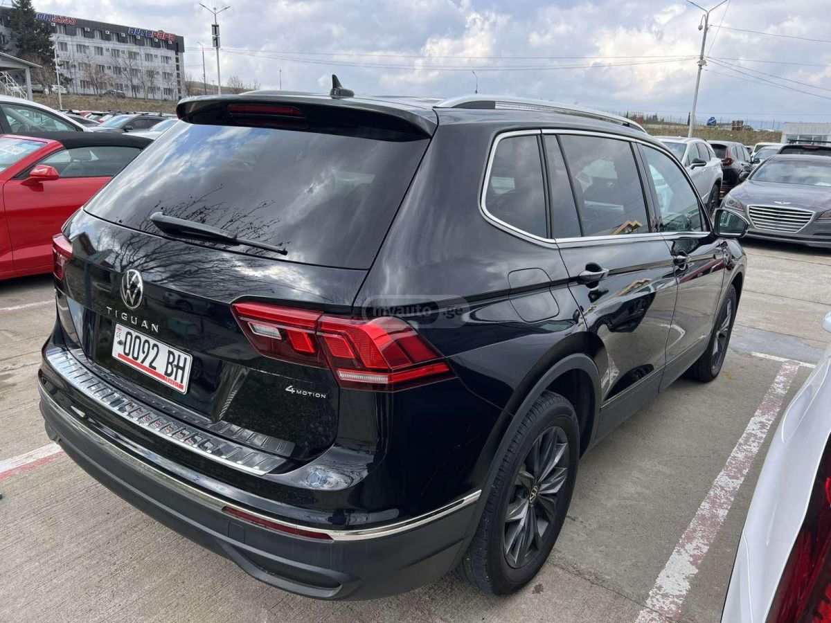 Volkswagen Tiguan - фото 4