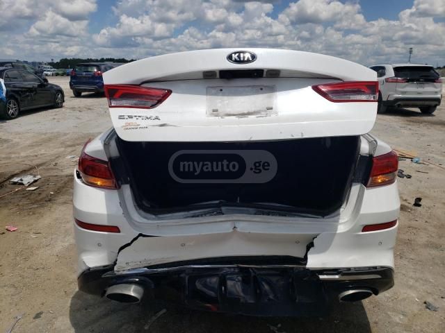 Kia Optima - фото 11