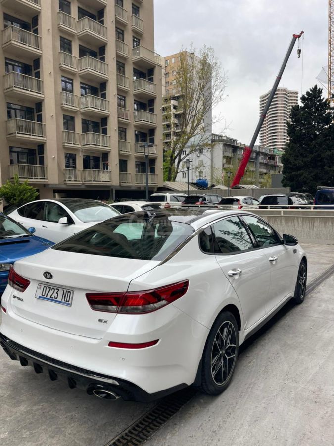 Kia Optima - фото 5