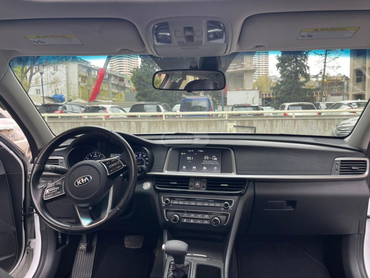Kia Optima - фото 7