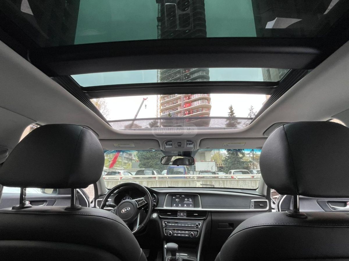 Kia Optima - фото 8